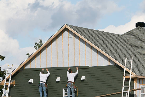 Professional Siding Replacement technician working in Duncan Falls, OH